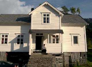 Timber house at the farm and new
restored mountain-hut in the mountain