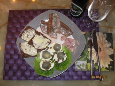 Sun eggs with marinated herring or smoked salmon