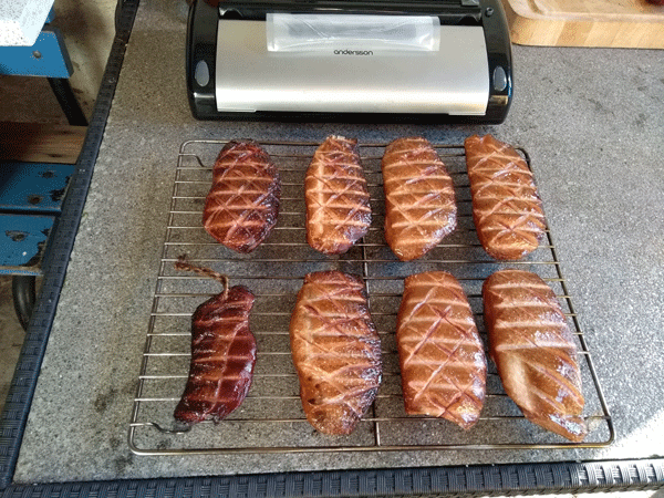 The finished smoked duck breasts are ready to be eaten