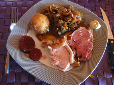 Brown cabbage with smoked bacon, salt pork, bread and mustard