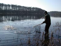 Dan is netting a sea trout 