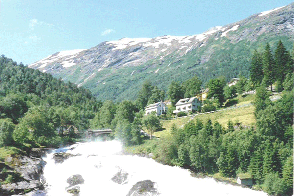 Look upstream Korsbrekke river, in the middle of summer there is snow on top