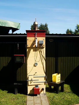 An extra Isokern chimney cap Smoking Oven is now tiled