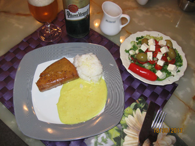 Marinated, smoked tuna steak with rice and salad