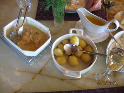 Baked haddock with white asparagus, new potatoes and dill sauce